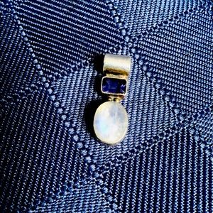 Silver pendant with stones